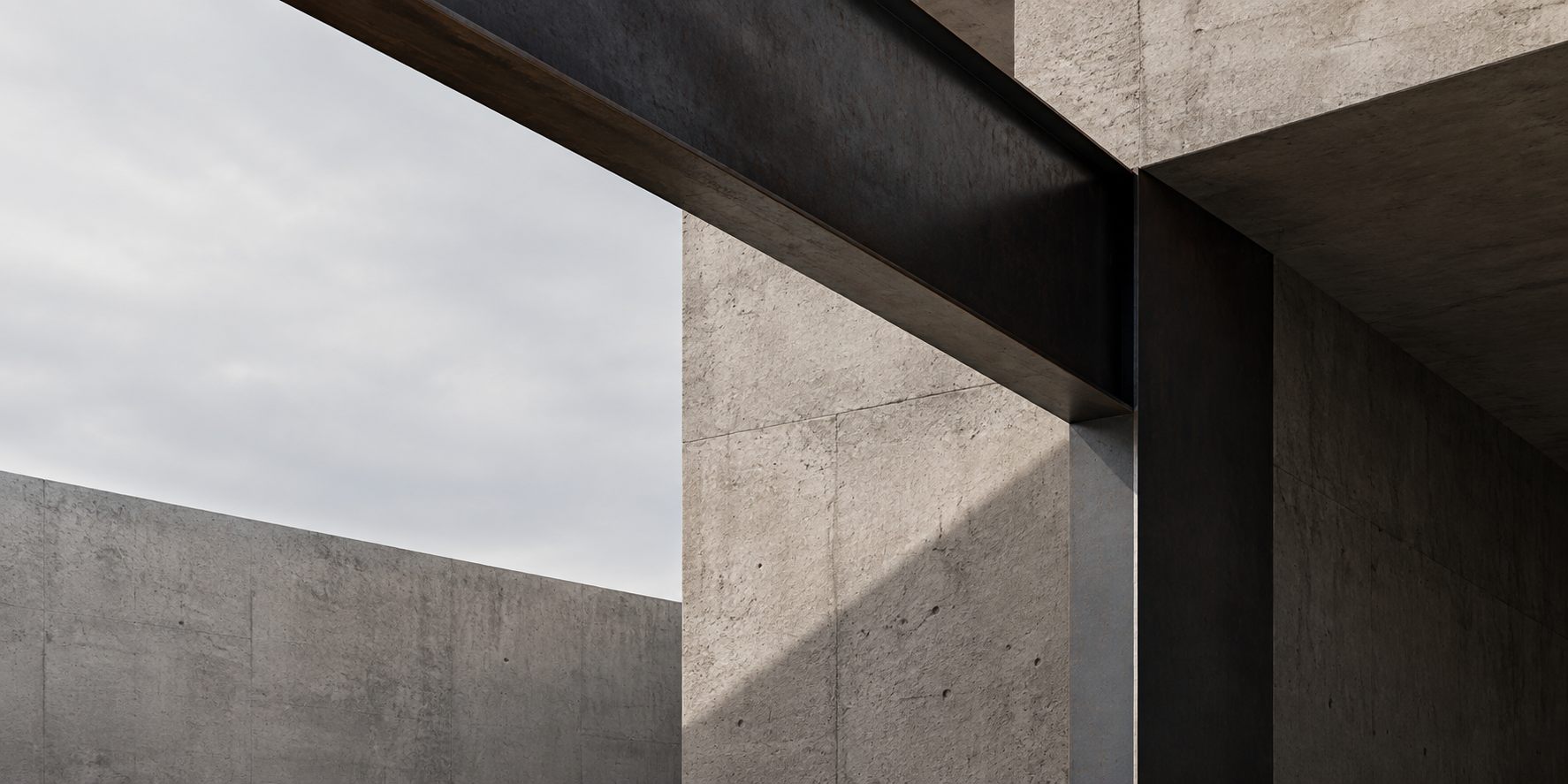 Estudio abstracto de concreto, acero y sombra.